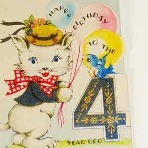 May include: A white cat wearing a blue jacket and a red and white checkered bow tie holds balloons that say "Happy Birthday to the 4 Year Old". A blue bird sits on the number 4.