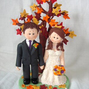 Fall Autumn theme bride and groom wedding cake topper with fall tree maple tree