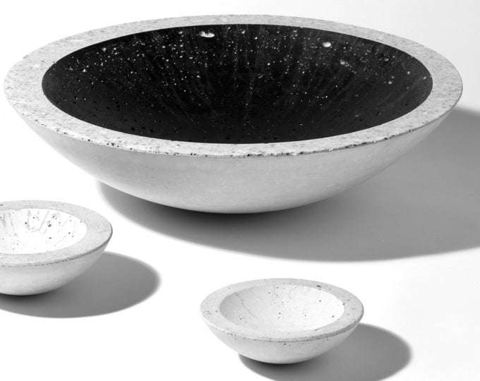 Concrete shell, hand-cast, black inside