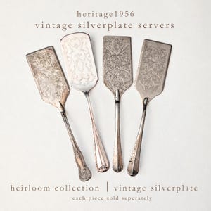 May include: Four silverplate servers with intricate engraved patterns on the flat blades. The text heritage1956 vintage silverplate servers and heirloom collection vintage silverplate each piece sold separately is visible on the image.