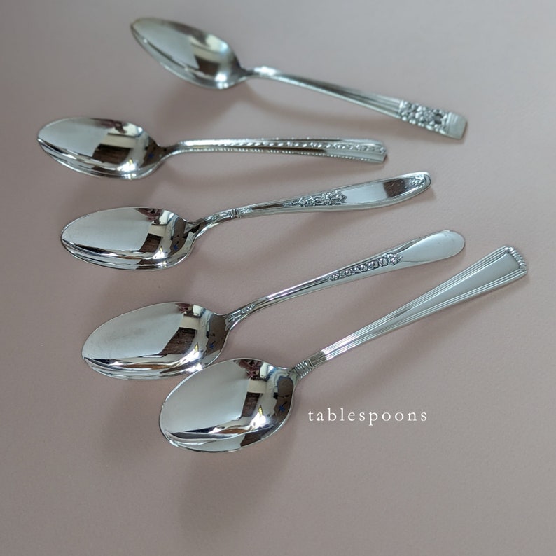 set of mis matched pattern silver plated flatware tablespoons.  sold in sets of 2 more flatware options also available to create a full set.