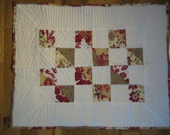 Block-style doll quilt