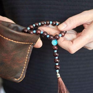 Bolsa de rosario de cuero personalizada con marco para apretar imagen 4