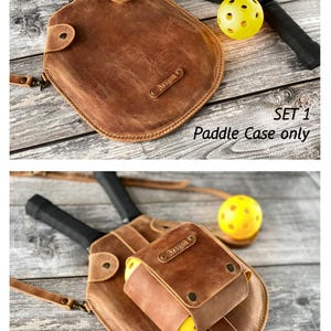 Puede incluir: Dos juegos de bolsas de cuero para raquetas de paddle. El primer juego incluye una bolsa de cuero marr&oacute;n para raqueta con una correa. El segundo juego incluye una bolsa de cuero marr&oacute;n para raqueta con una correa y un portapelotas separado. Ambas bolsas tienen una etiqueta de nombre personalizada que dice "Aragon".