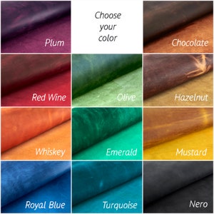 May include: A color chart showing 12 different leather colors. The colors are: Plum, Chocolate, Red Wine, Olive, Hazelnut, Whiskey, Emerald, Mustard, Royal Blue, Turquoise, and Nero.
