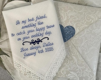 May include: White embroidered handkerchief with blue thread, featuring the text "To my best friend, something blue to catch your happy tears on your wedding day, Love always, Dallas January 4th 2025".