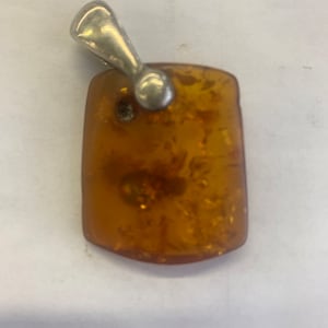 Amber and silver Austrian pendant