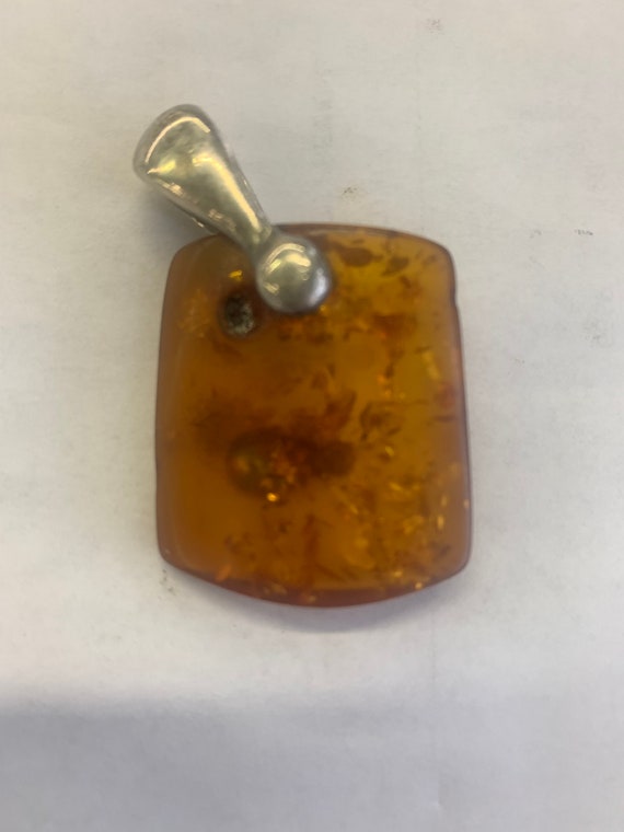 Amber and silver Austrian pendant