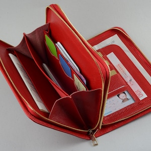 Cartera roja Apple iPad mini con asa para mini iPad mini de Apple Estuche tipo cartera para llevar en la mano Monedero con asa para dama