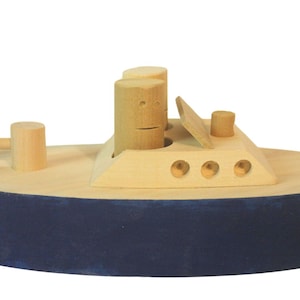 Toy wood police boat with two removable figures. (Not made to float)