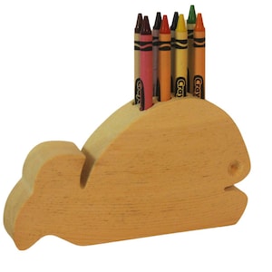 Whale crayon holder with 8 crayons included. Makes a great organizer and pick up incentive once the crayons have been removed from the box