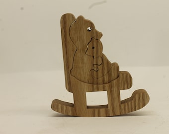 Mama and baby bear in a rocking chair. This cute little toy makes a great decoration for a child's room.