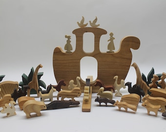 Noah's animal ark, pairs of animals made from various hardwoods. Choice of oak,cherry or walnut for ark and removable ramp