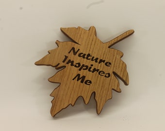 Nature inspires me leaf-shaped sign handcrafted from oak and Sapele