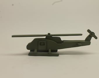 Wooden toy UH-1 (Huey) helicopter with spinning main rotor and tail rotor