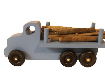 Logging truck, solid poplar, branches to simulate cut trees included