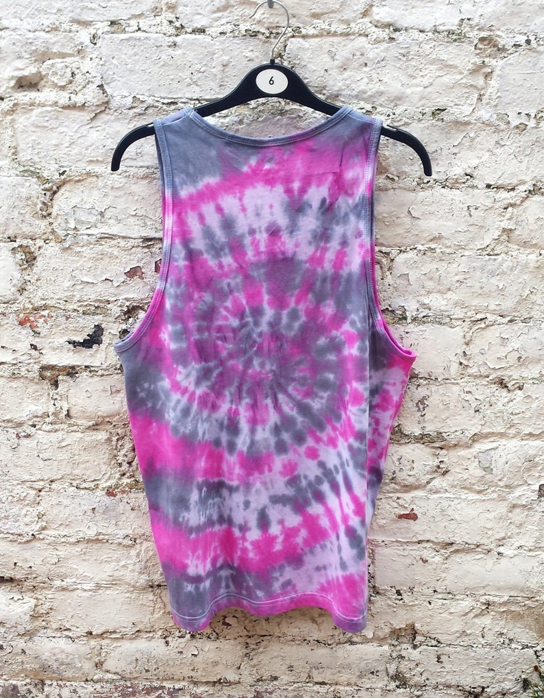 A tie-dye tank top with a pink and gray swirl pattern.
