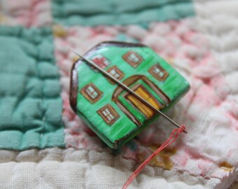 Green House Needle Minder