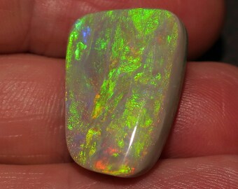 Large Lightning Ridge Opal with Bright Green, Gold, Red, blue and orange Colors. Double sided, Ideal for pendant. 14.2 Carats 22 x 15 x 6mm