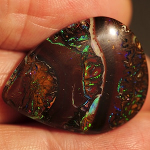 Koroit Opal from Australia Double sided with bright colors and lovely pattern. Great Pendant stone 28.20 Carats 28 x 22 x 5mm