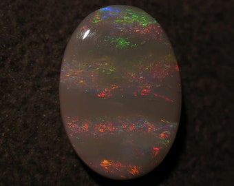 Lightning Ridge Black Opal gem with gorgeous striped confetti pattern 5.10 Carats 18 x 13 x 3mm Fantastic ring or pendant stone
