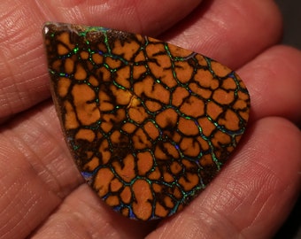Beautiful Boulder Opal with Awesome Earthquake pattern of bright Neon Green and Blue colors. 52 Carats 36 x 29 x 6-7mm