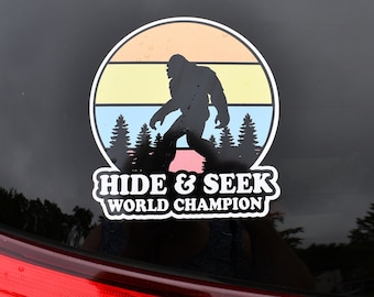 2 Sasquatch Big Foot Car Decals Sticker Hide & Seek World Champion Truck Glass Hunting Expedition Mountail Trail Runner Men's Women's Gift