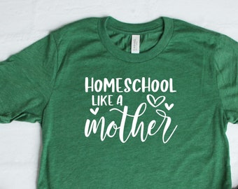 May include: Green t-shirt with the text "Homeschool like a mother" in white lettering with two small hearts.