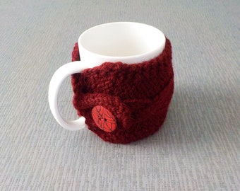 Mug cosy with round button cable design deep wine red British wool