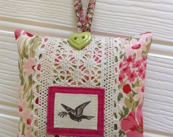 Hanging decorative mini pillow and door hanger