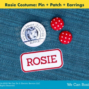 May include: A red and white patch with the word "ROSIE" in white lettering. Two red and white polka dot earrings are also shown. The background is a blue fabric.