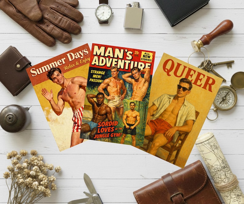 May include: Three vintage-style comic book covers with illustrations of men. The covers feature text like "Summer Days," "Man's Adventure," and "Queer." Surrounding the comics are leather gloves, a watch, a lighter, and other accessories.