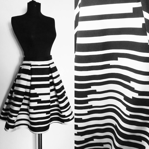 Black and white striped skirt online india top