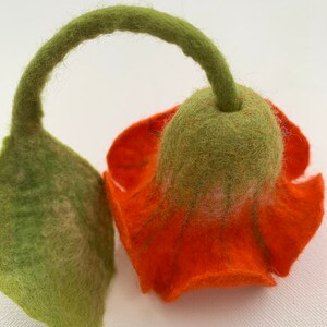 Key fob, bag charm with flowe felted by hand Orange