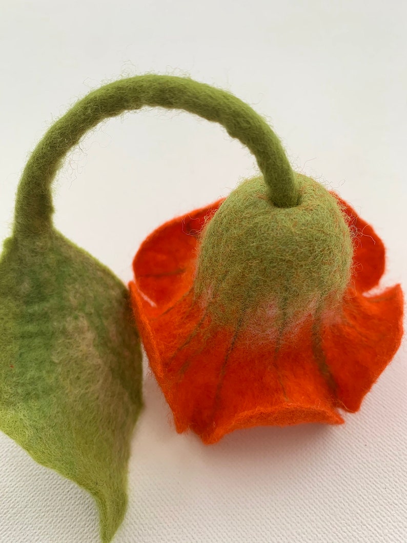 Key fob, bag charm with flowe felted by hand Orange