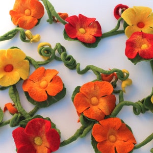 Felt garland with the flowers of nasturtium. A nice gift for Easter or as decoration for the window