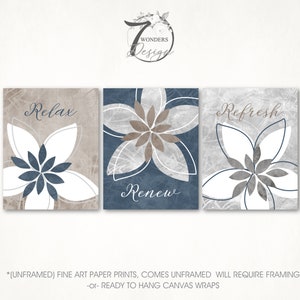 May include: Three unframed canvas prints with a floral design in shades of blue, gray, and white. The prints feature the words "Relax", "Renew", and "Refresh".