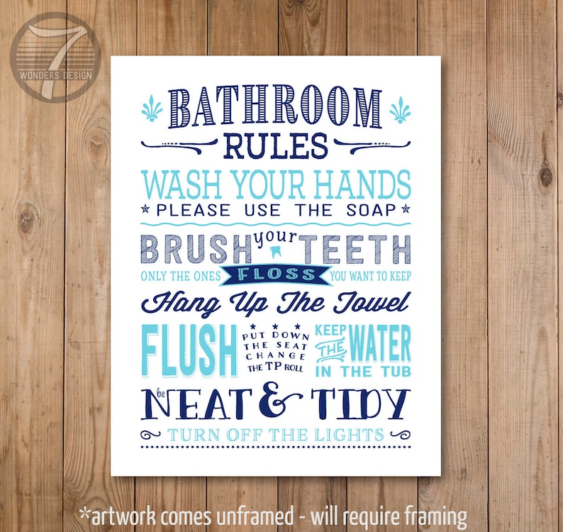 May include: A white bathroom rules sign with blue and light blue text. The sign says "Bathroom Rules" and lists rules such as "Wash your hands", "Brush your teeth", "Floss", "Hang up the towel", "Flush the water", "Be neat and tidy", and "Turn off the lights".