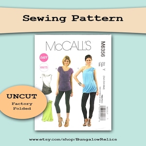 May include: McCall's sewing pattern M6356 for a knit top with a one-shoulder design. The pattern is uncut and factory folded. The pattern is for sizes X-Small, Medium, and Large.