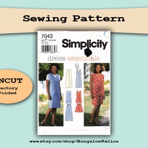 May include: Simplicity pattern 7043 for a dress, uncut and factory folded. The pattern includes three different dress styles, one with a sleeveless bodice and two with a sleeveless top and shorts.