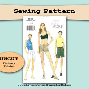 May include: Uncut sewing pattern for women's shorts. The pattern is labeled "7096" and "Very Easy Vogue". The pattern shows three women wearing different styles of shorts.