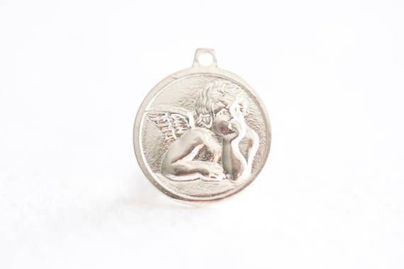 Sterling silver cupid disc pendant Sterling silver cupid disc pendant