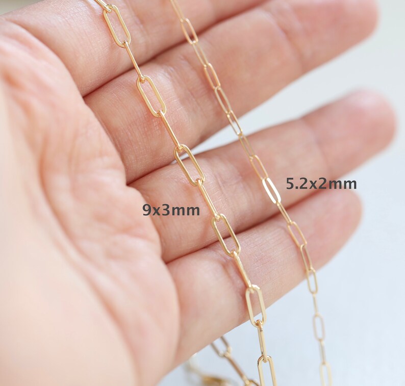 May include: Gold chain necklace with two different sized links. The larger links measure 9x3mm and the smaller links measure 5.2x2mm.
