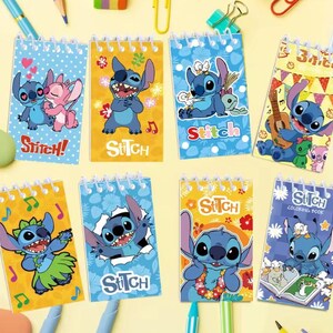 May include: A collection of spiral-bound notebooks featuring the character Stitch from the Disney movie Lilo & Stitch. Each notebook has a different design, with Stitch in various poses and settings, and the word "Stitch" is printed on each cover.