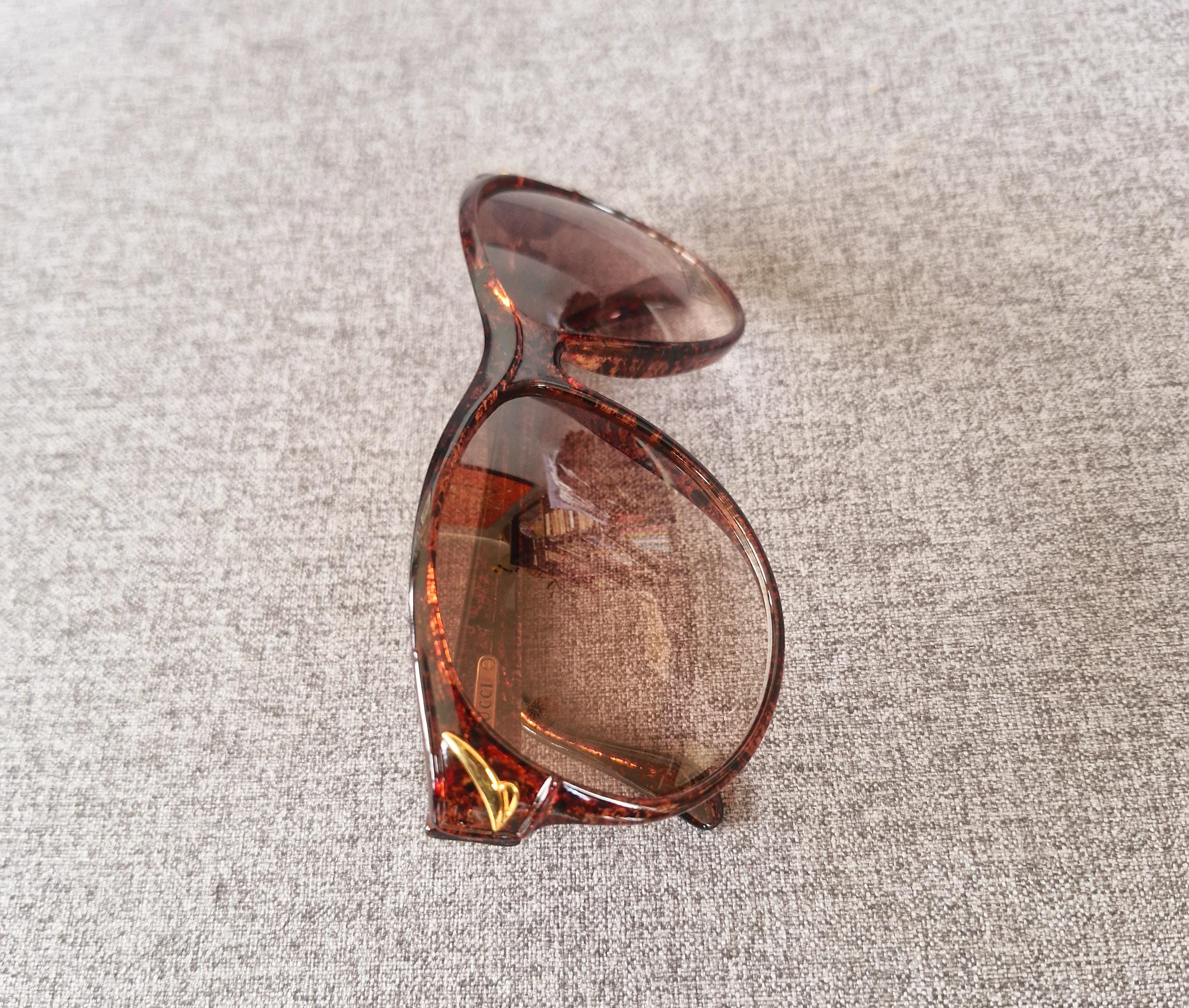 ヴィンテージの半透明アンバー＆ブラックの斑点模様のラウンドフレーム