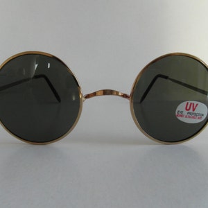 Lunettes de soleil rondes parfaites vintage dorées