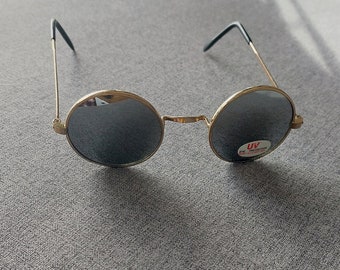 Lunettes de soleil vintage rondes dorées à verres miroir argentés