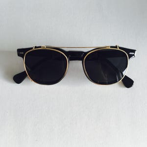 Vintage Shiny Black Classic Optical Frame with a Gold Sunglass Clip-on