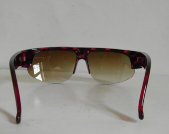 Lunettes de soleil à rayures translucides roses cerise et noires à