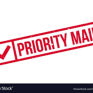 May include: Red rubber stamp with a checkmark and the text "PRIORITY MAIL" in white.